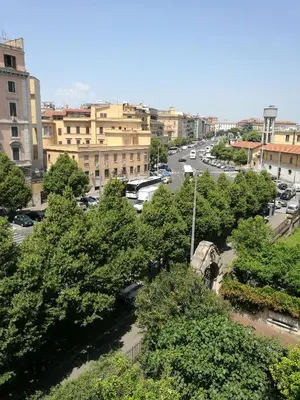 a view of a city with trees and a street at In Rome in Rome