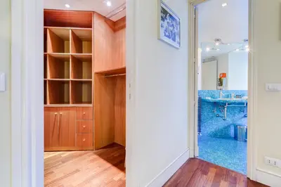 a bathroom with a walk in shower and a sink at Luxury House Belle Arti Rome City Center in Rome