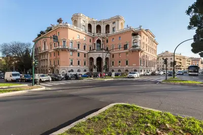 a large building on a street in front of a road at Luxury House Belle Arti Rome City Center in Rome