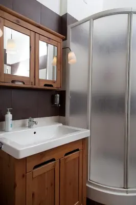a bathroom with a sink and a shower at Santa Croce in Rome