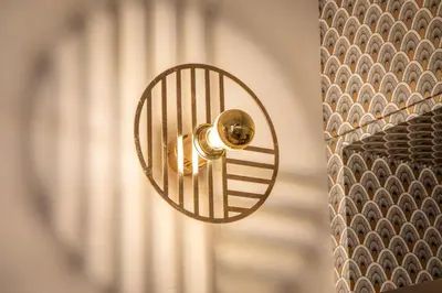 a door knob on a door with a curtain at Casavignoni elegant 3BR home near to Spanish step in Rome