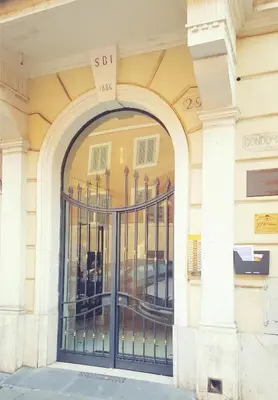 an entrance to a building with an iron gate at Marcelina vaticans rooms in Rome