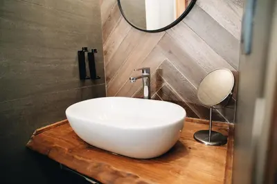 a bathroom with a white sink and a mirror at DownTown Boutique House - CA Domus Collection in Rome