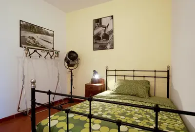 a bedroom with a bed in a room at Light of Rome in Rome