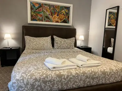 a bedroom with a bed with two towels on it at Appia Avenue 639 in Rome
