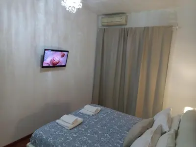 a bedroom with a bed with two towels on it at Appia Avenue 639 in Rome