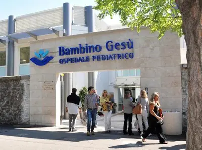 a group of people standing outside of a building at Simon Holiday House in Rome