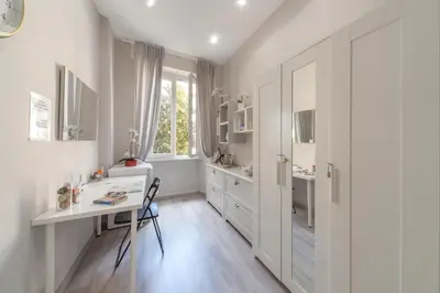 a home office with a desk and a sink at San Pietro Holidays in Rome