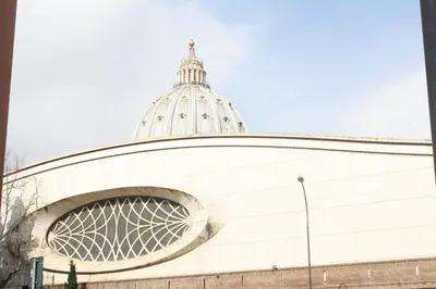 a building with a dome on top of it at San Pietro Holidays in Rome