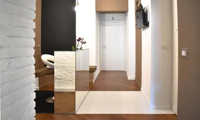 a living room with a marble counter and a hallway at Bibi e Romeo's Home in Rome