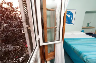 a room with a window and a bed in it at B&B A Casa Di Nancy in Rome