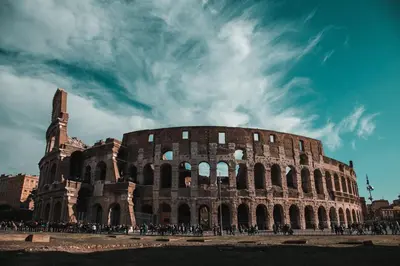 a large building with people standing in front of it at Le Sibille in Rome