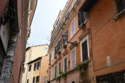 an alley in an old town with buildings at Trust-Trastevere in Rome