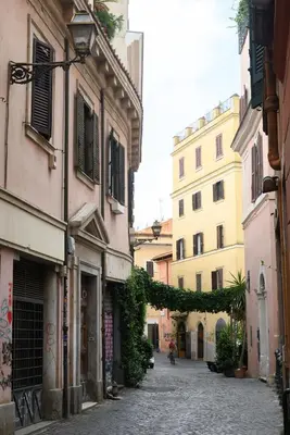 an alley in an old town with buildings at Trust-Trastevere in Rome