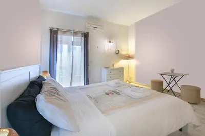 a bedroom with a large bed and a window at BB Danilo in Rome