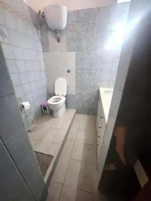 a bathroom with a toilet and a sink at Sepulveda in Rome