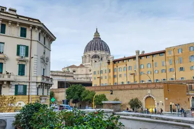 a view of a city with a building and a cathedral at All'Ombra Del Cupolone Guest House in Rome
