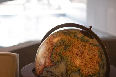 a globe sitting on top of a table at Hotel Caravel in Rome