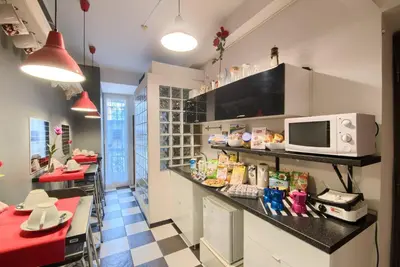 a kitchen with a counter with a microwave on it at Barbara Vaticano Affitti Brevi in Rome