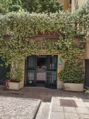 an open door to a building with plants over it at Mini Suite Indipendente in Rome