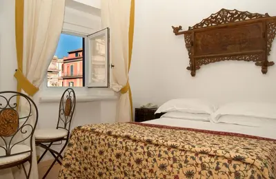 a bathroom with a sink and a tub and a sink at Hotel Fontana in Rome