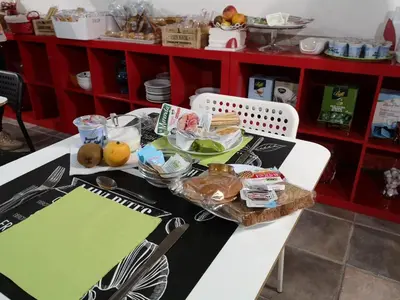 a table with food on it in a kitchen at Hotel Seiler in Rome