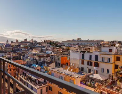 a view of a city from a balcony at FH55 Grand Hotel Palatino in Rome