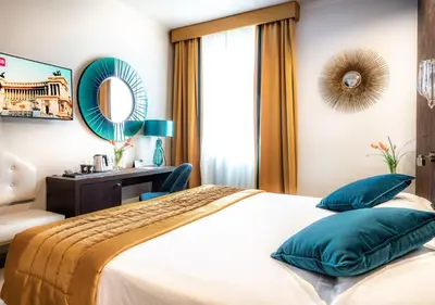 a bedroom with a bed and a desk and a mirror at FH55 Grand Hotel Palatino in Rome