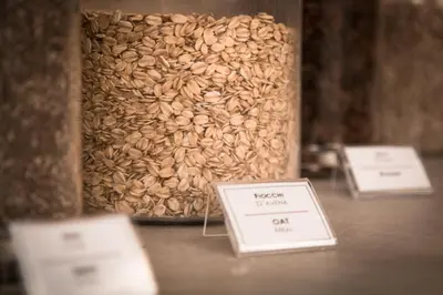 a bunch of bags of seeds sitting on a table at Hotel Raganelli in Rome