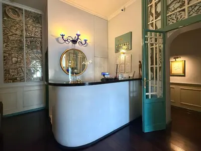 a room with a counter and a mirror on the wall at Lilium Boutique Hotel in Rome