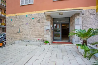 a brick building with a door and a courtyard at Vatican Station in Rome