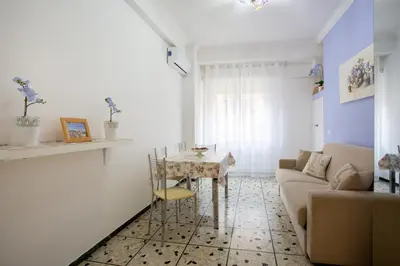 a living room with a couch and a table at Vatican Station in Rome