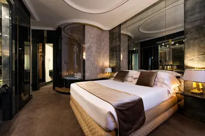 a bedroom with a large bed in a room at Atlante Star Hotel in Rome