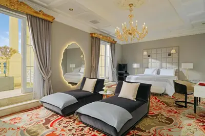 a large bedroom with a bed and a large window at The Westin Excelsior, Rome in Rome