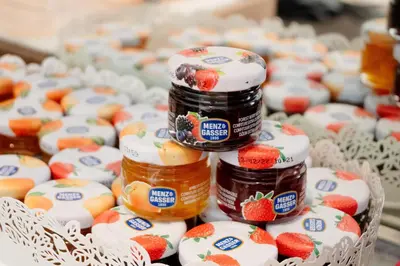 a display of jam and strawberries in jars at Ludovisi Palace Hotel in Rome
