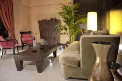 a living room with a couch and a coffee table at c-hotels Fiume in Rome