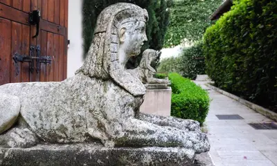 a statue of a woman sitting on a bench at Best Western Ars Hotel in Rome