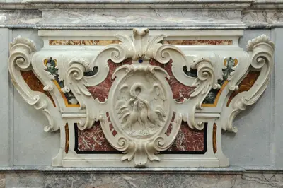 a building with a sculpture on the side of it at Hotel Farnese in Rome