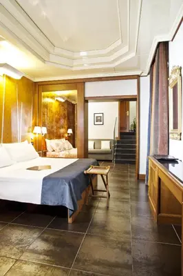 a bathroom with a white sink and a shower at Hotel Valadier in Rome