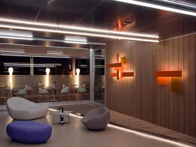 a room with chairs and a table and a dining room at Hotel Zone in Rome