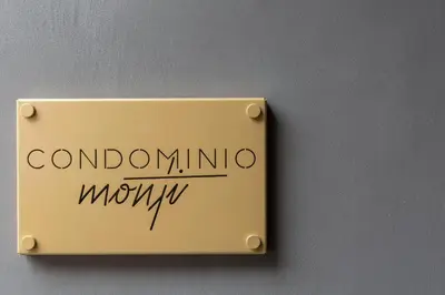 a sign on a wall with the words coronatio monkey at Condominio Monti Boutique Hotel in Rome