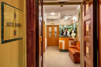 a hallway of a hotel room with a lobby at Hotel Dorica in Rome