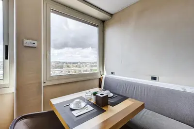 a dining room with a table and a window at Best Western Hotel Piccadilly in Rome