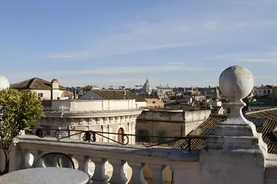 a view of a city from a balcony at Hotel Genio in Rome
