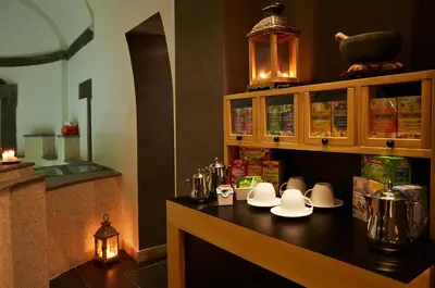 a counter in a restaurant with a light on it at The Code Hotel in Rome