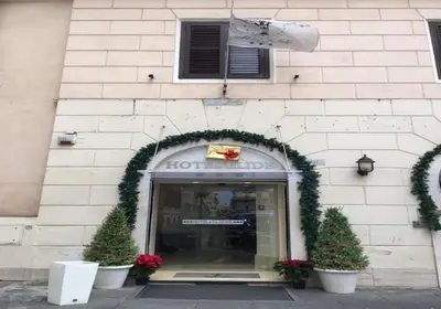 a front door of a hotel with christmas decorations at Hotel Elide in Rome