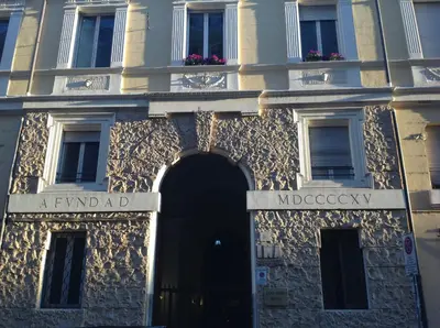 a building with a sign that reads a fund ad mdocody at Hotel Sant'Angelo in Rome