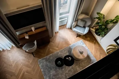 an overhead view of a living room with a television at Antico Albergo del Sole al Pantheon in Rome