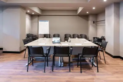 a conference room with a large table and chairs at Garner Hotel Rome Aurelia by IHG in Rome
