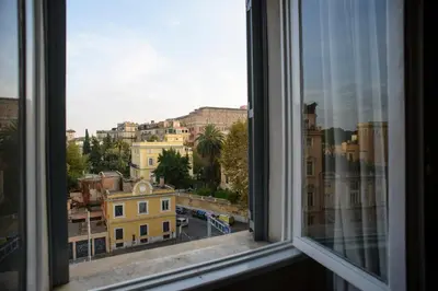 a view of a city from a window at Amici di Roma in Rome